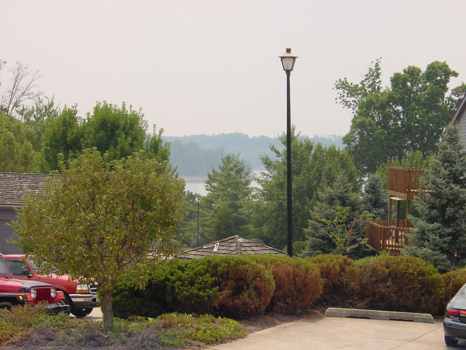Hilly, wooded grounds at Harbour Pointe