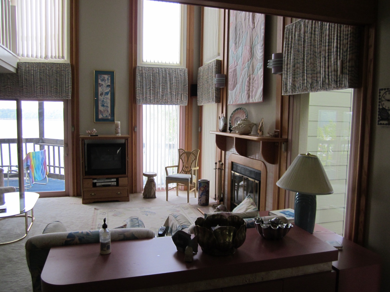 Pink interior of Harbour Pointe #7 with shell decor and lake view