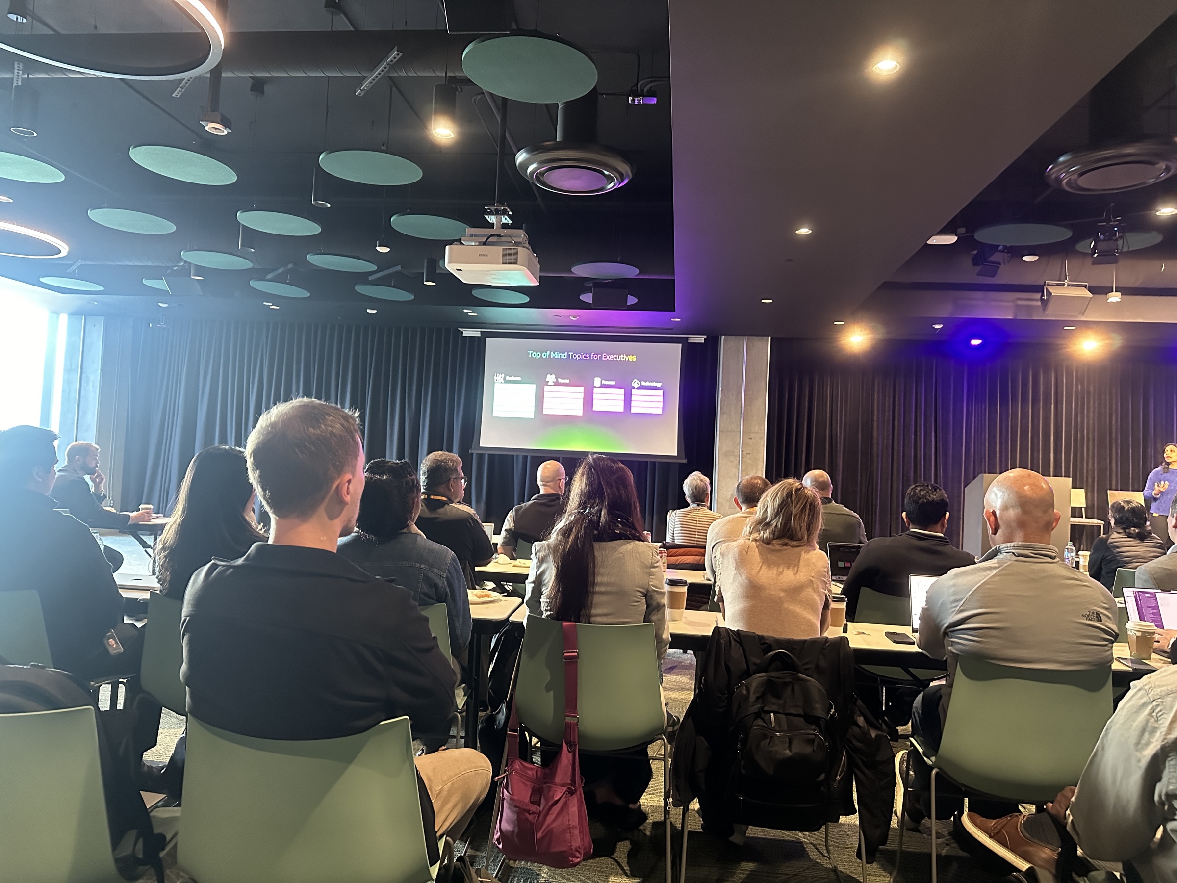 People attending a professional presentation